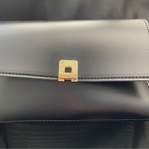 Miniso black and gold crossbody bag